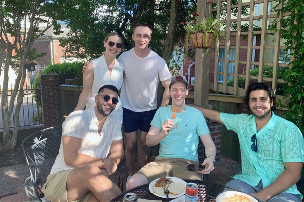 Residents relaxing at a table outdoors