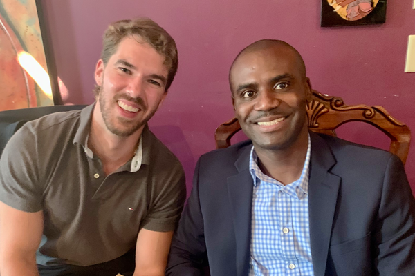 Residents sitting at a table in a restaurant during graduation