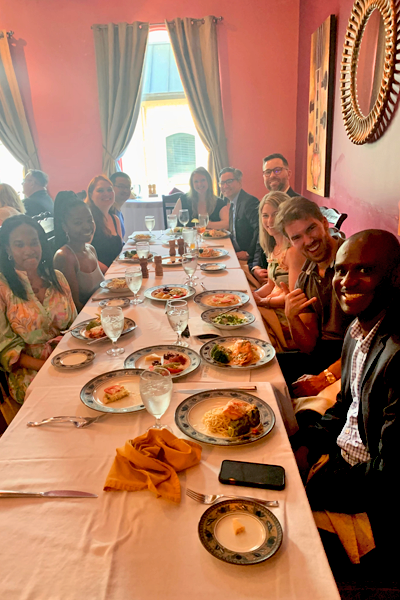 Everyone at a dinner table during graduation