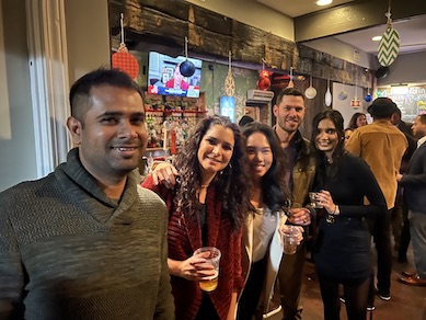 Large group of faculty at the holiday party