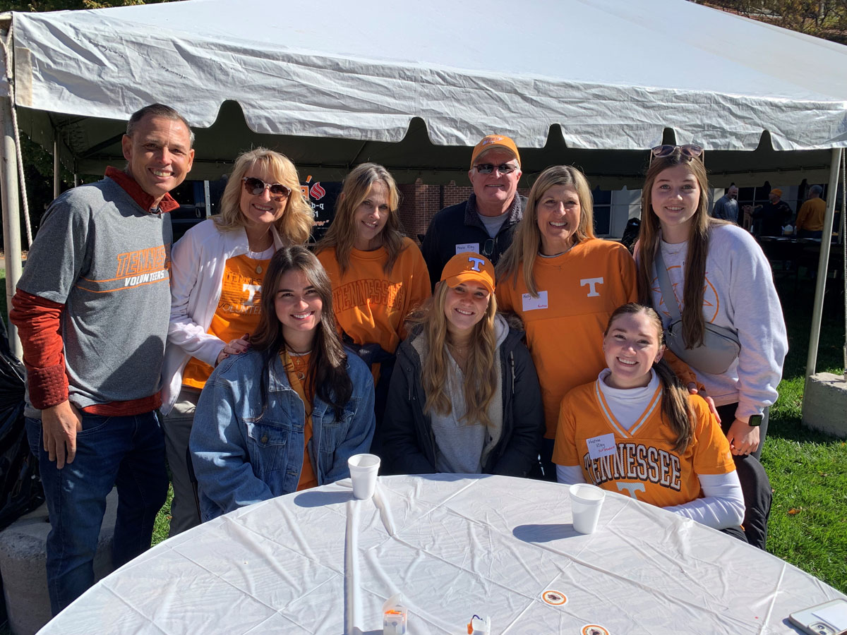 Family Weekend and Alumni Homecoming 2023 photo of a group of alum outside after lunch.