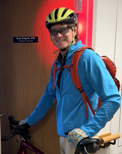 Program Director Dr Gregorie bikes to work