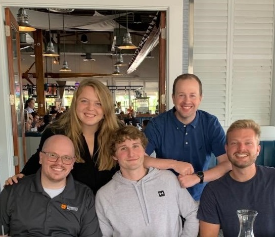 Dr Frank Tift at lunch with members of his mentor group