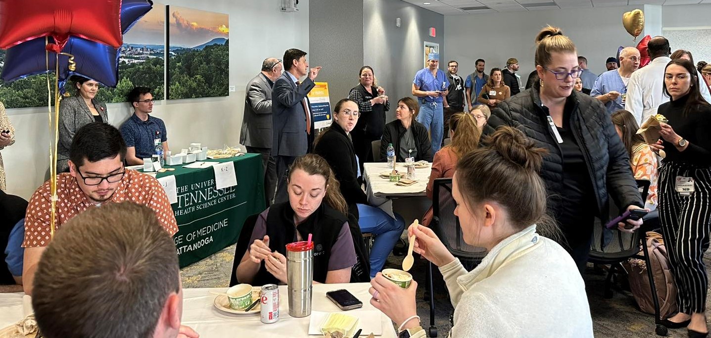 James Haynes, MD, Dean for the Chattanooga Campus welcomes everyone to our Thank a Resident Day celebration with lots of smiling residents and guests enjoying the fun.  Nolan English and Stacey Malecky were behind the table distributing Gift Cards!