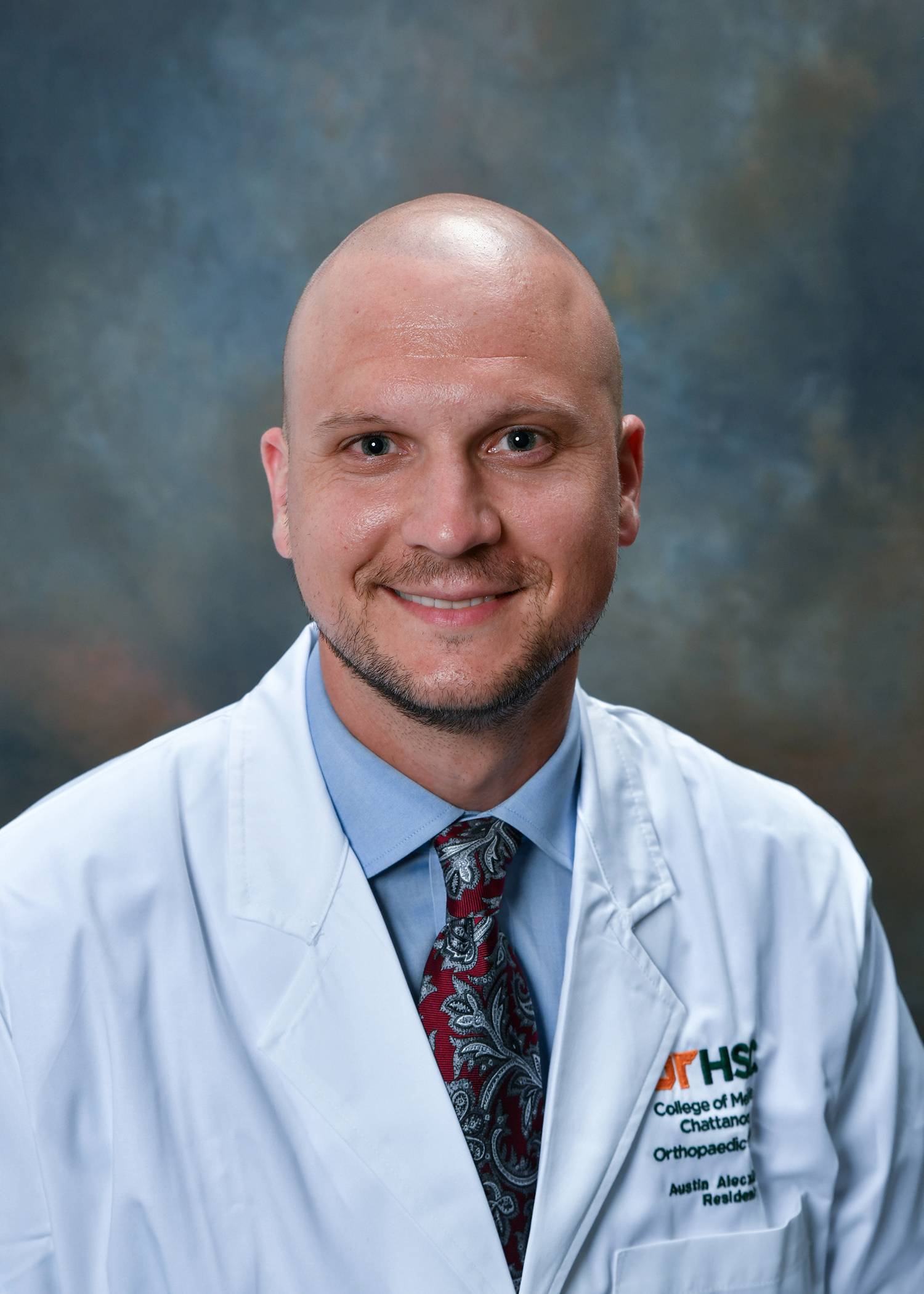 Dr. Austin Alecxih