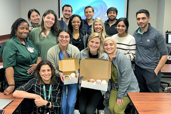 Residents inside a classroom with cupcakes