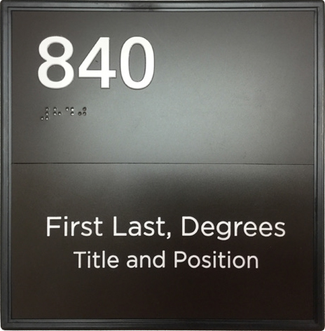 Example of an ADA compliant door sign that has room number, name, degrees, title and position.