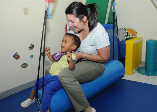 therapist with child patient