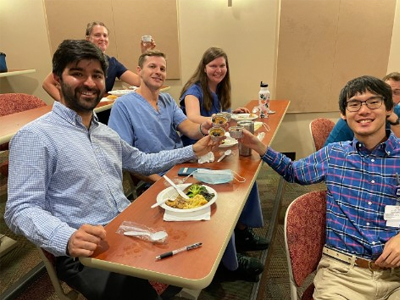 Residents eating at a table