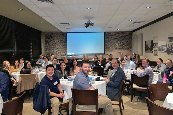 Residents and faculty at dinner