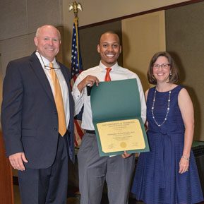 Dr. Mitchell with a graduate