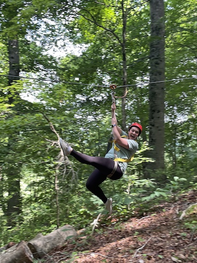 Resident outdoors ziplining