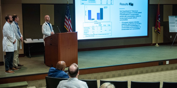 Residents giving a presentation