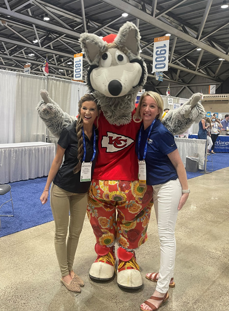 Two residents with KC mascot