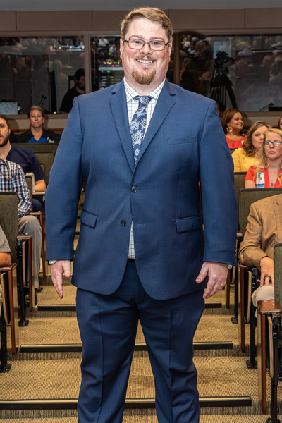 Resident in graduation audience aisle