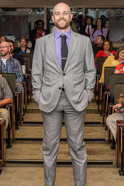 Resident in graduation audience aisle