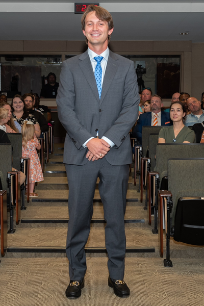 Male walking the aisle at graduation