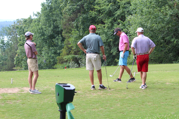 Male residents on a golf course