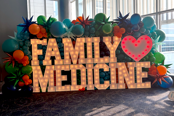 Family medicine lighted sign with balloons