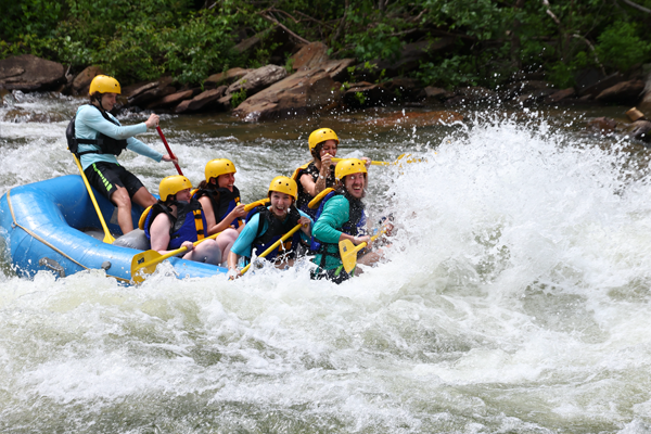 Residents rafting on a river