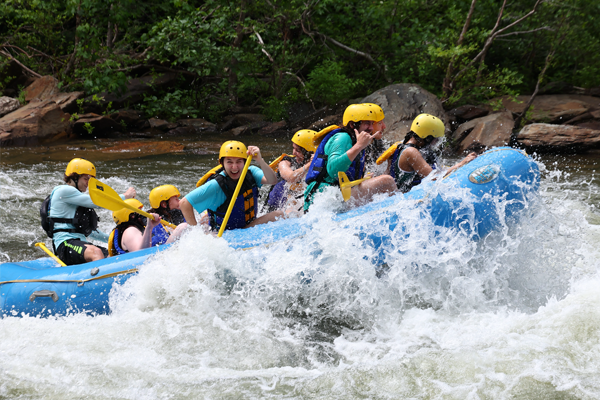 Residents rafting on a river