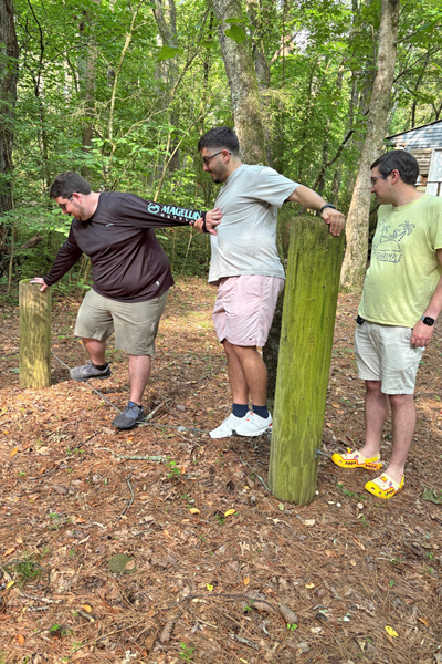 Residents holding hands during a team building exercise