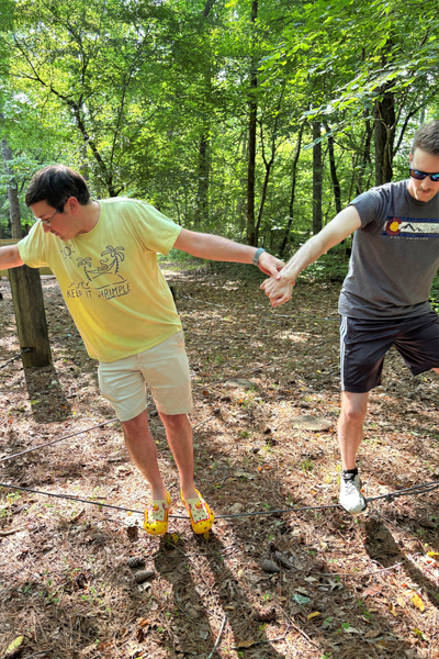Residents holding hands during a team building exercise