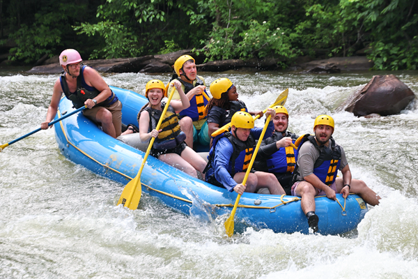 Residents rafting on a river