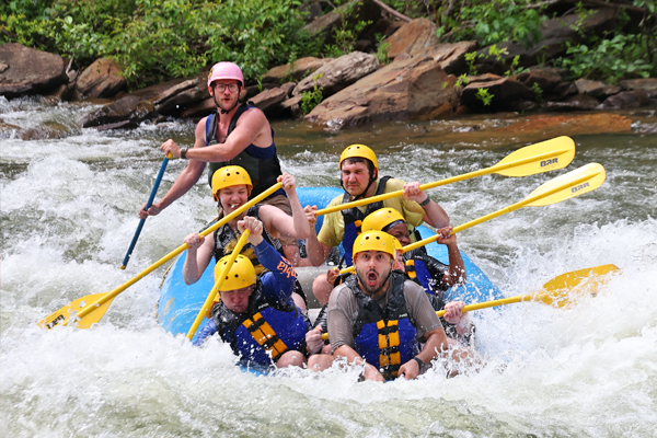 Residents rafting on a river