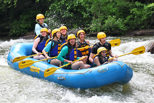 Residents rafting on a river