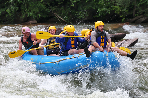 Residents white water rafting