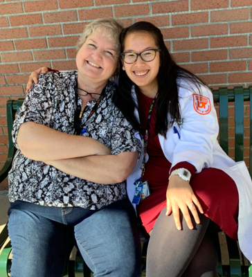 Chief and coordinator sitting on a bench