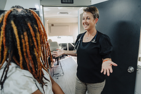 woman smiling and talking
