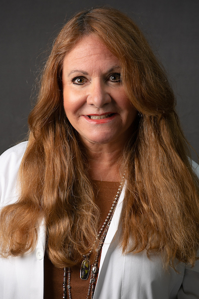 Woman in lab coat