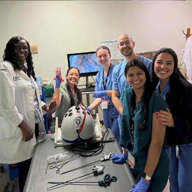 Residents participating in a hands-on simulation training session