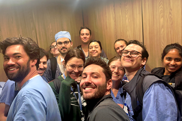 Residents posing in an elevator