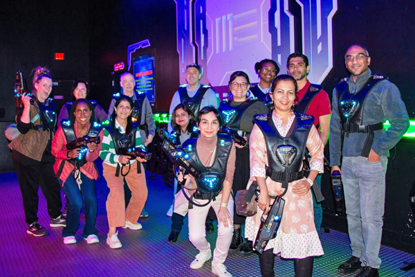 Group photo in a laser tag room