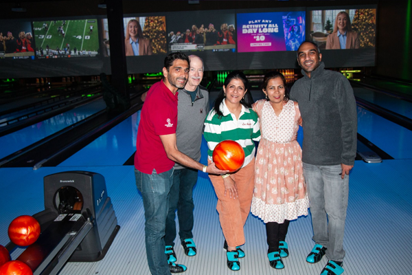 Residents/faculty in a bowling alley