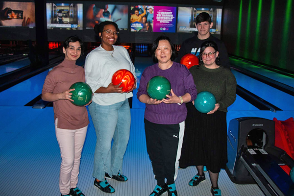 Residents/faculty in a bowling alley