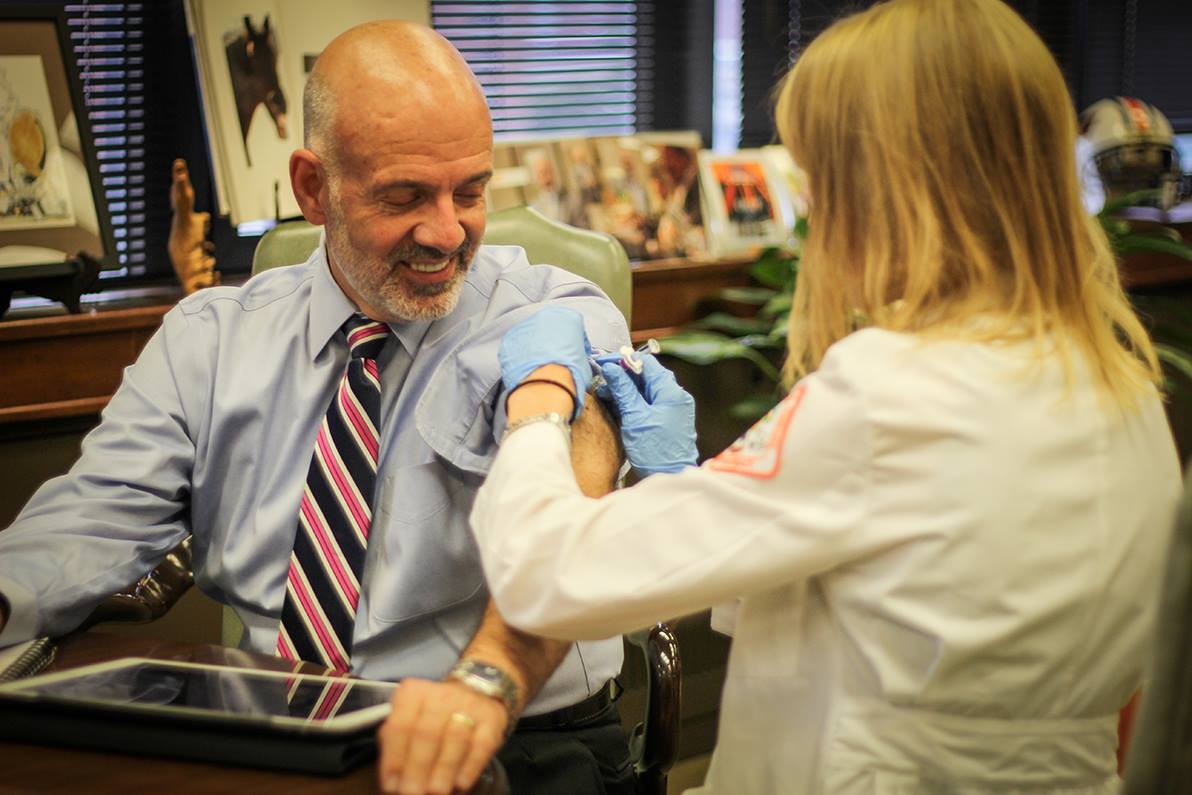 Student Pharmacist Gives Vaccine.