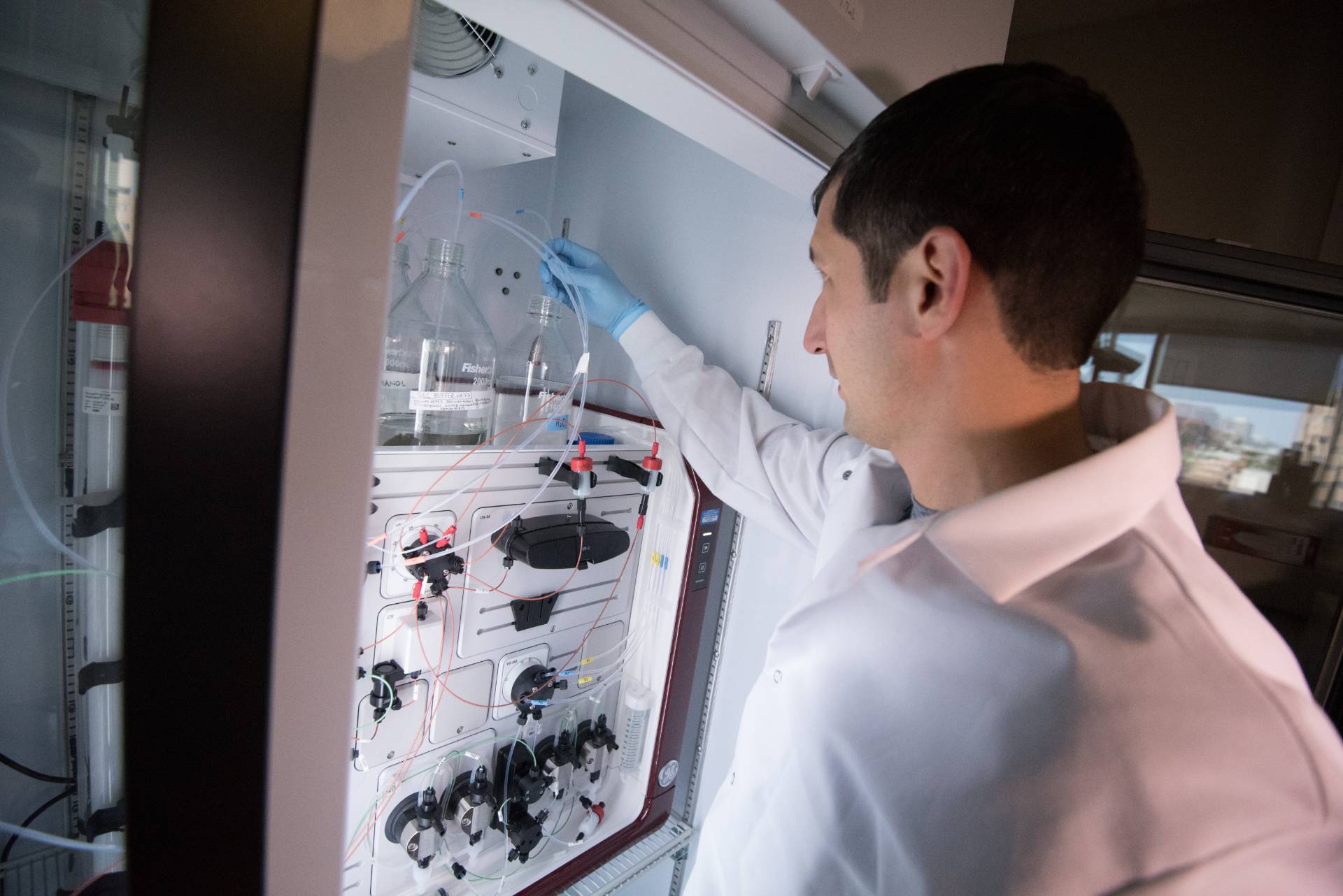 Pharmacy PhD student in a laboratory setting.