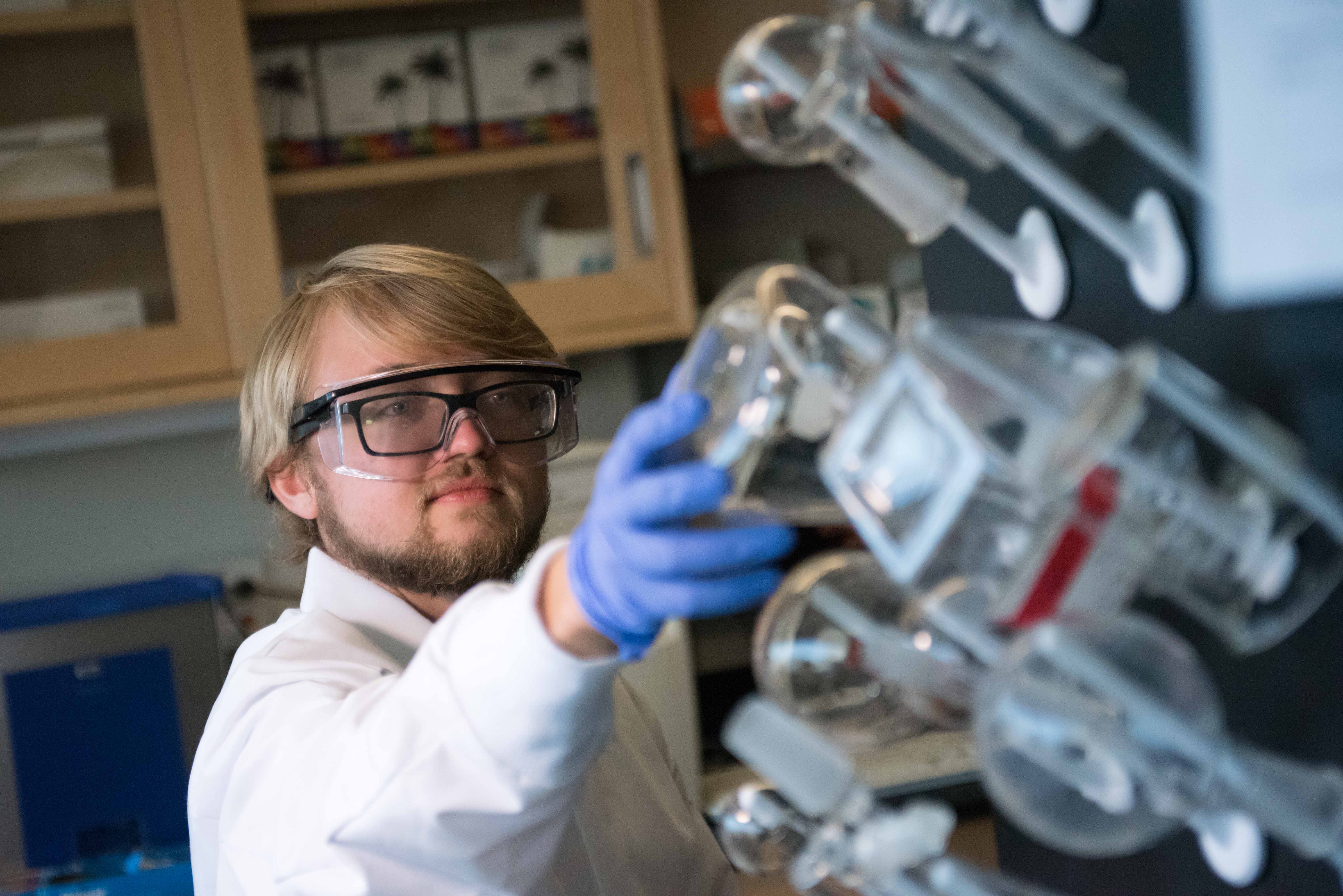 Student reseracher in a research setting.