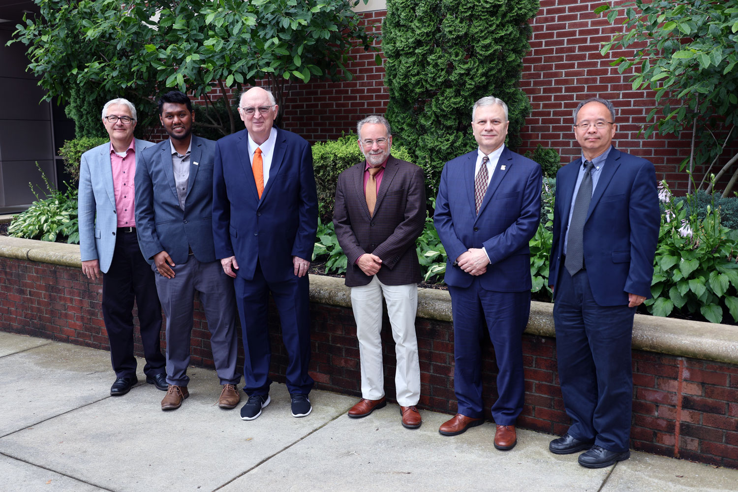 2025 Duane D. Miller Lectureship Awardee with Planning Committee