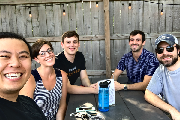 Residents sitting at a tabel outside