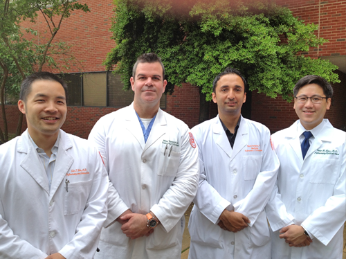 Fellows and faculty outside the Coleman Building