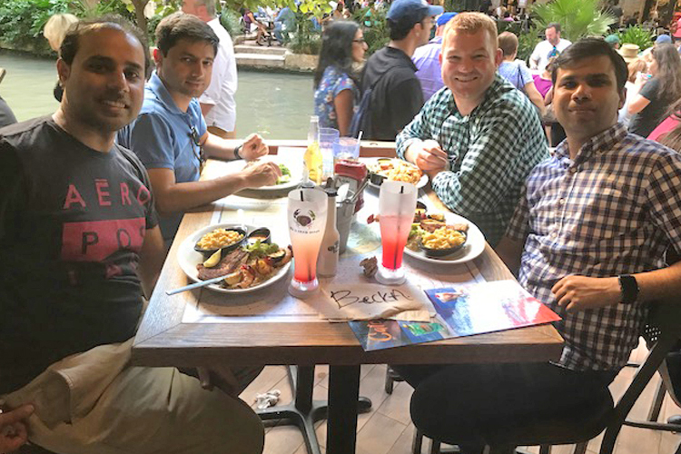 Fellows at an outside picnic