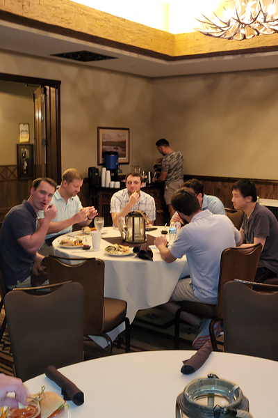 Residents eating at a dinner table at the Bass Pro Shop