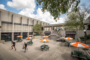 Students run outside of the SAC.