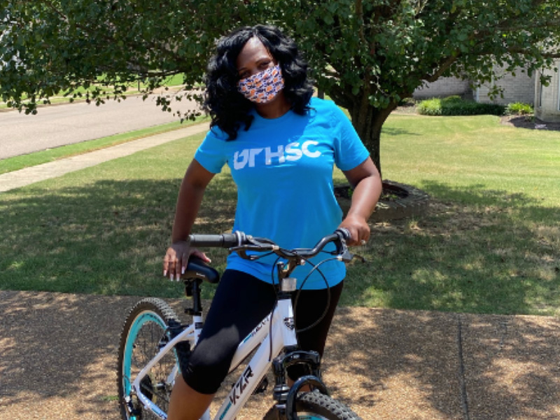 woman posing on bicycle